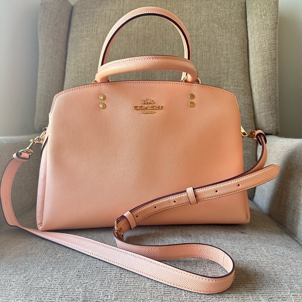 Large pink Coach shoulder bag